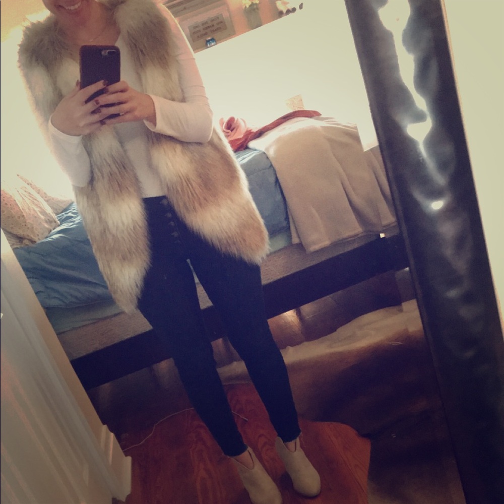 Skies are blue faux fur vest